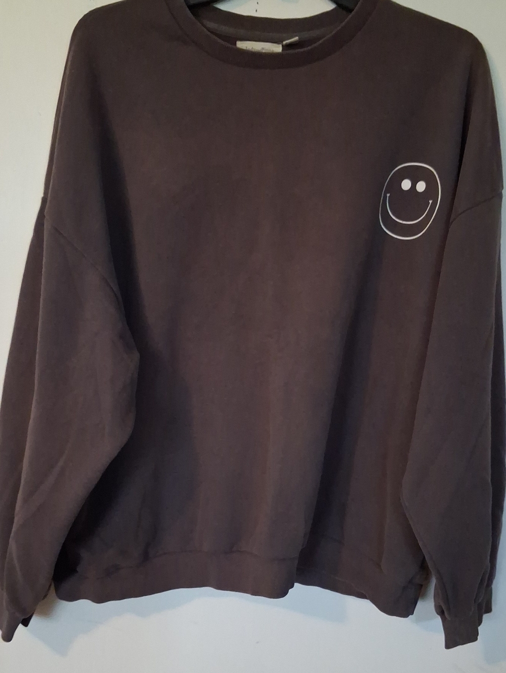 Men's Brown Crewneck Sweatshirt with Small White Smiley Graphic